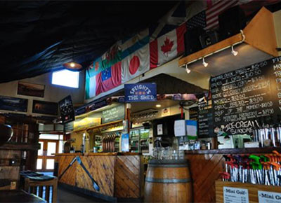 The bar with country flags at Schnapps Bar National Park Village