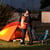 A couple embracing outside their tent at Discovery Lodge camp site