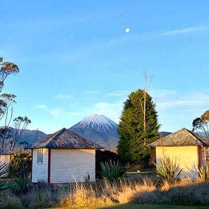Discovery Lodge Tongariro camping huts with Mt Ngauruhoe in the background
