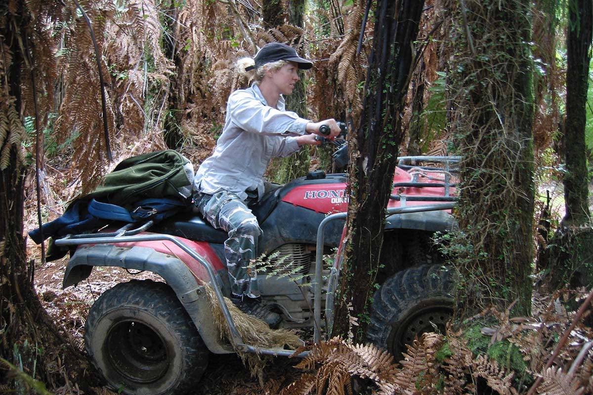 Miki up the bush on the quad