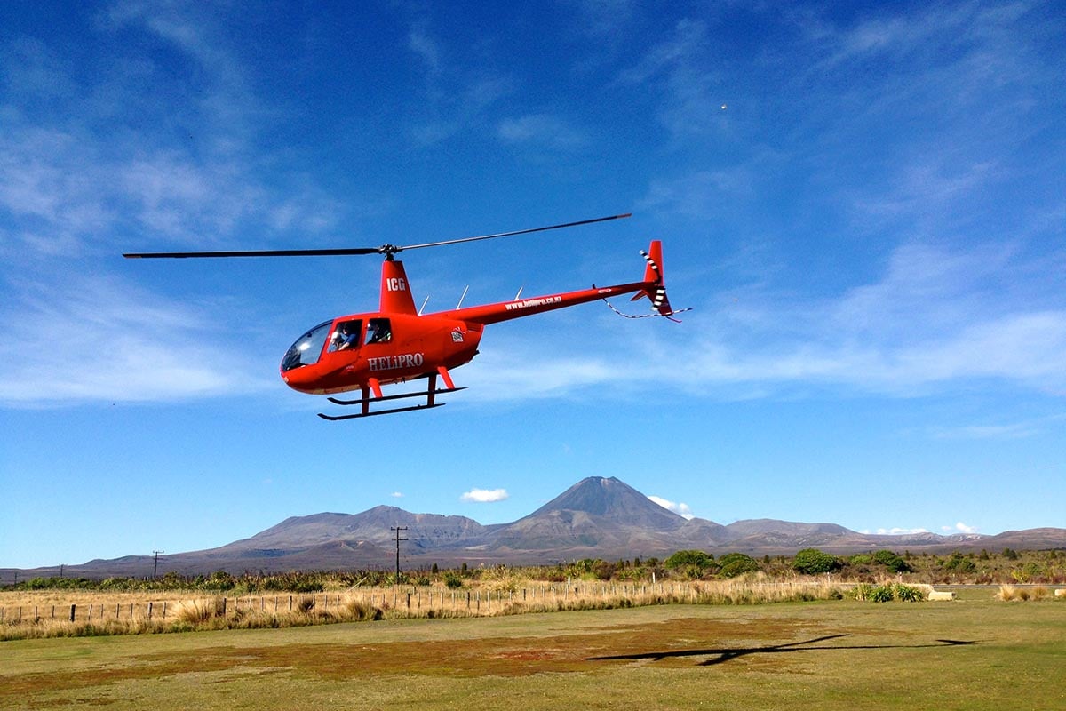 Helipro R44 taking off from Discovery Lodge