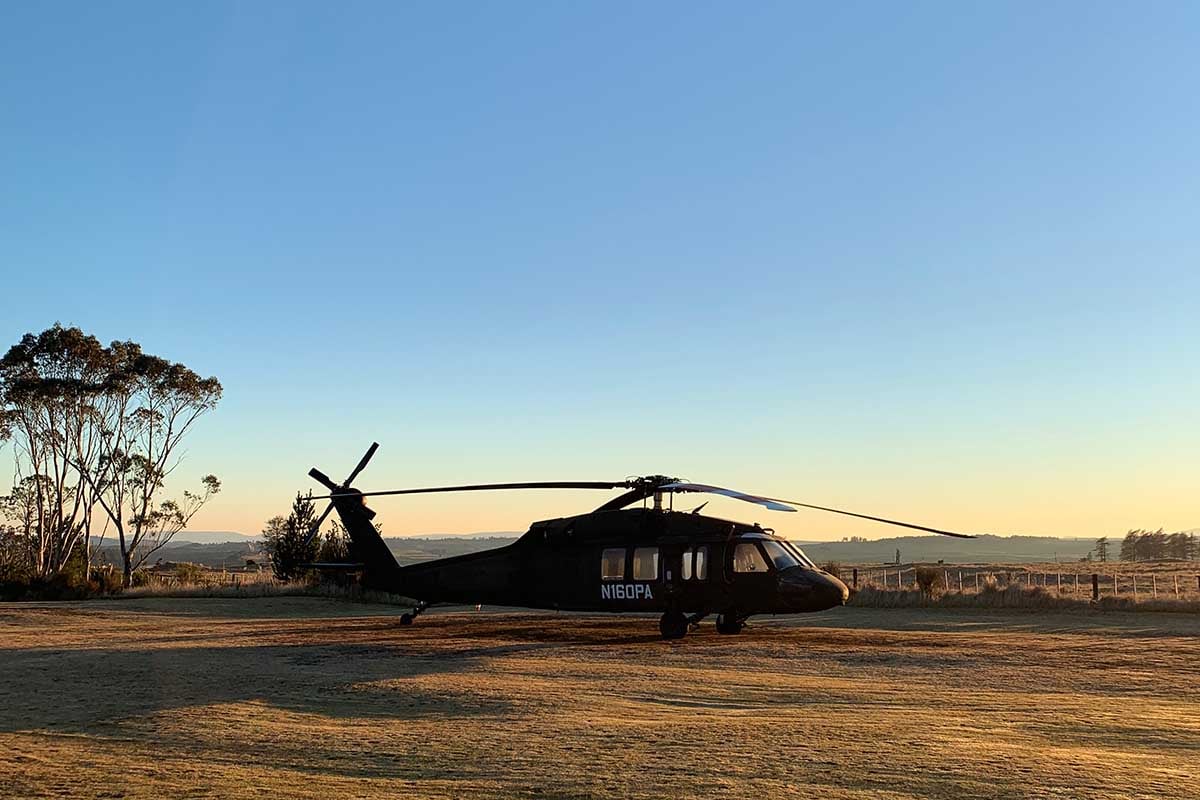 Early morning sunrise from Discovery helipad with silhouette of Kahu Blackhawk