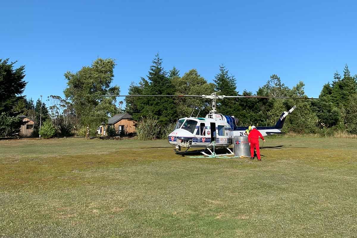 Beck Helicopters ZK-HHB, checking load before take off from Discovery Helipad