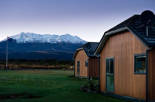 Two chalets with a close up view of Mt Ruapehu and the Tongariro National Park from Discovery Lodge