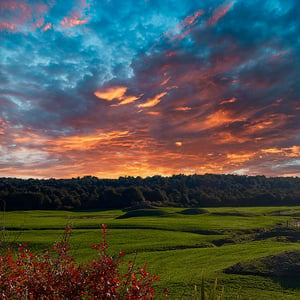 Sun setting over beach forest and alpine meadows viewed from a Discovery Lodge Tongariro motel