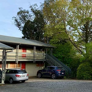 Discovery Lodge Tongariro motel exterior surrounded by trees